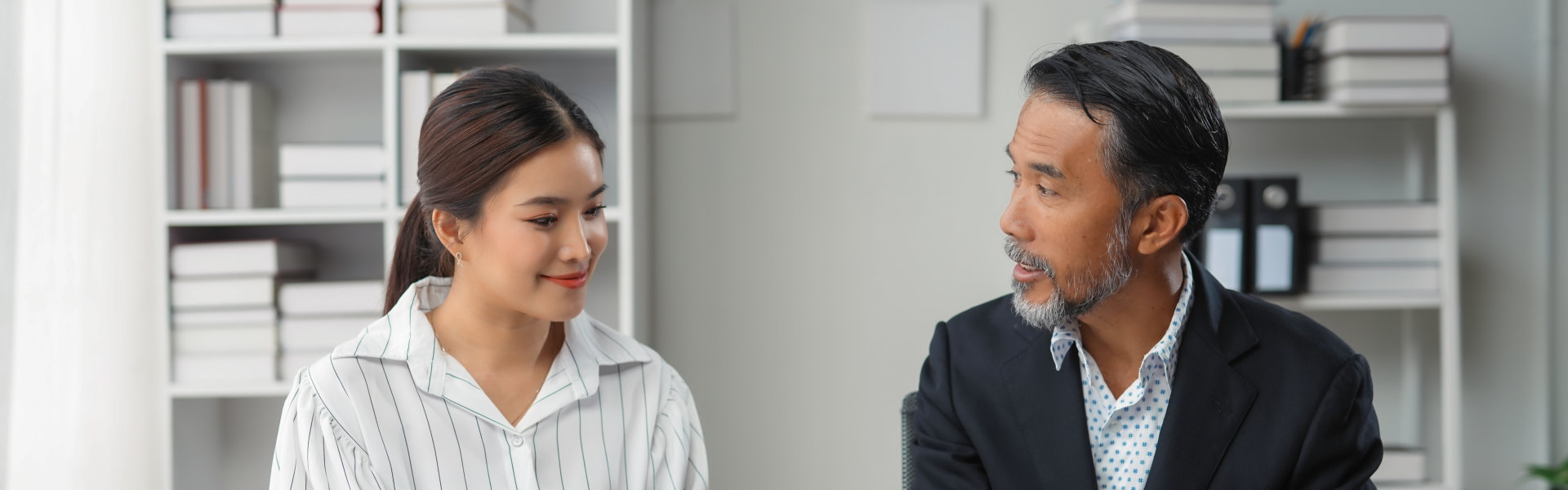 man talking to woman